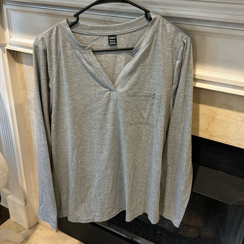 Size XL. Gray long sleeve tee.  Never worn.  Listing #715